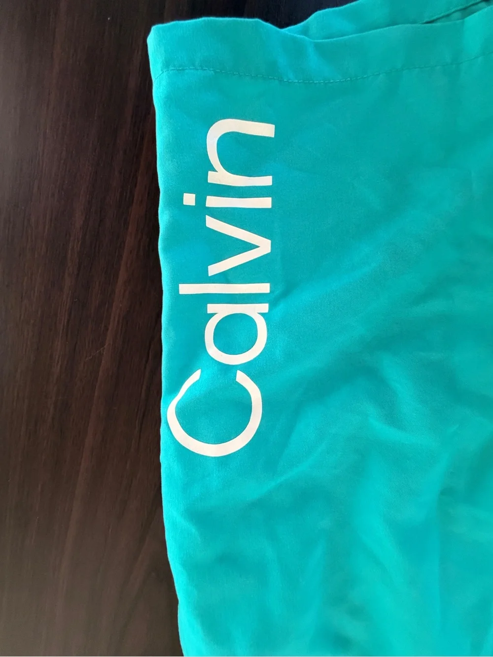 Calvin Klein Bright Teal Swim Shorts with White Logo